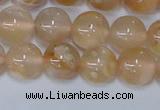 CAA1073 15.5 inches 10mm round sakura agate gemstone beads