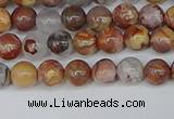 CAA1220 15.5 inches 4mm round gold mountain agate beads