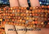 CAA2829 15 inches 4mm faceted round fire crackle agate beads wholesale