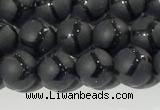 CAA3655 15.5 inches 6mm round matte & carved black agate beads