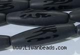 CAA3681 15.5 inches 8*30mm rice matte & carved black agate beads