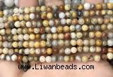 CAA4933 15.5 inches 4mm round yellow crazy lace agate beads wholesale