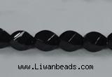 CAB335 15.5 inches 8*12mm faceted & twisted rice black agate beads