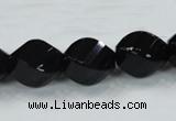 CAB337 15.5 inches 15*20mm faceted & twisted rice black agate beads