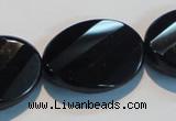 CAB816 15.5 inches 22*30mm faceted & twisted oval black agate beads