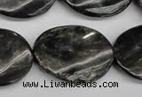 CAE110 15.5 inches 22*30mm twisted oval astrophyllite beads wholesale