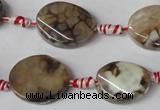 CAG1576 15.5 inches 15*20mm twisted oval fire crackle agate beads