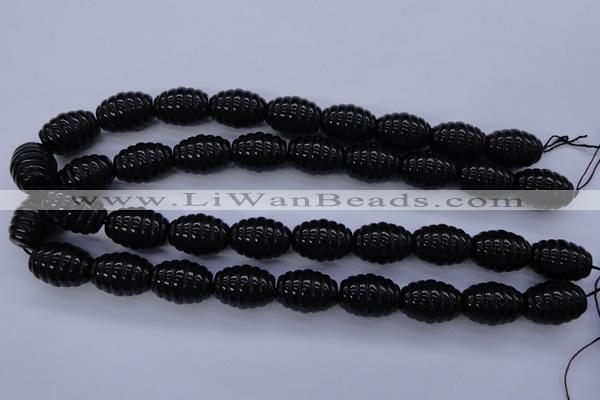 CAG1693 15.5 inches 15*20mm carved rice black agate beads