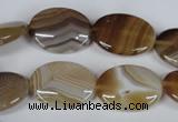 CAG3132 15.5 inches 12*16mm oval brown line agate beads