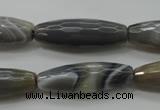 CAG3958 15.5 inches 10*30mm faceted rice grey botswana agate beads