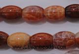 CAG4191 15.5 inches 12*16mm rice natural fire agate beads