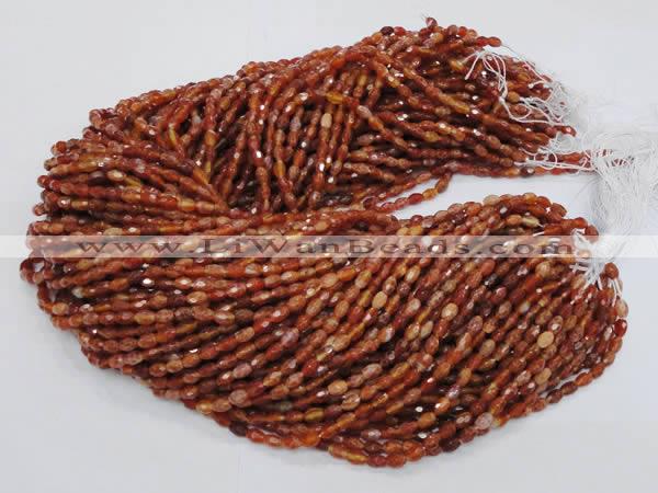 CAG597 15.5 inches 4*6mm faceted rice natural fire agate beads