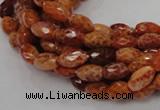 CAG598 15.5 inches 8*12mm faceted rice natural fire agate beads