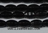 CAG6029 15.5 inches 6*10mm faceted rice matte black agate beads