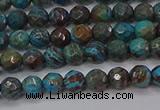 CAG9480 15.5 inches 4mm faceted round blue crazy lace agate beads