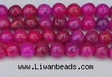 CAG9924 15.5 inches 4mm round fuchsia crazy lace agate beads