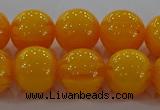 CAR404 15.5 inches 12mm round synthetic amber beads wholesale