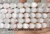 CCA380 15.5 inches 10*12mm rice white calcite gemstone beads