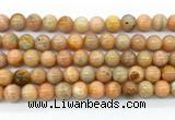 CCA553 15.5 inches 10mm round peach calcite gemstone beads