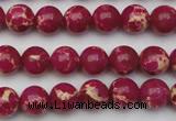 CDE2034 15.5 inches 6mm round dyed sea sediment jasper beads