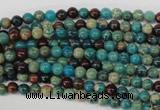 CDS25 15.5 inches 4mm round dyed serpentine jasper beads