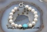 CFB1016 Hand-knotted 9mm - 10mm potato white freshwater pearl & blue howlite bracelet