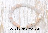 CFB711 faceted rondelle pink aventurine & potato white freshwater pearl stretchy bracelet