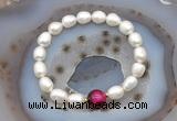 CFB916 9mm - 10mm rice white freshwater pearl & red tiger eye stretchy bracelet