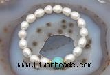 CFB926 9mm - 10mm rice white freshwater pearl & blue sea sediment jasper stretchy bracelet