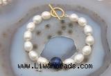 CFB980 Hand-knotted 9mm - 10mm rice white freshwater pearl & blue tiger eye bracelet