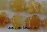 CFG1000 15.5 inches 16mm carved flower yellow jade beads