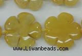 CFG458 15.5 inches 24mm carved flower yellow jade beads