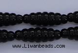 CFG760 15.5 inches 10*30mm carved rice black agate beads