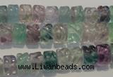 CFL471 15.5 inches 6*8mm carved rondelle natural fluorite beads