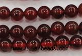 CGA601 15.5 inches 6mm A grade round natural orange garnet beads