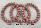 CGB4123 7.5 inches 8.5mm - 9mm round rhodochrosite beaded bracelets