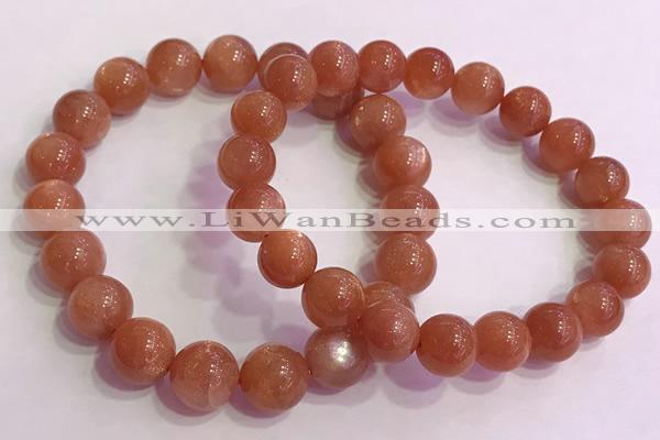 CGB4540 7.5 inches 10mm - 11mm round golden sunstone beaded bracelets