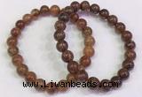 CGB4601 8mm - 9mm round golden rutilated quartz beaded bracelets