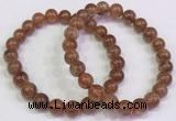 CGB4608 8mm - 9mm round golden rutilated quartz beaded bracelets