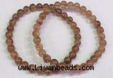 CGB4612 6mm - 7mm round golden rutilated quartz beaded bracelets