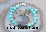 CGB6586 8mm round blue howlite & black lava adjustable bracelets