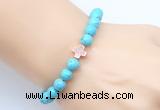 CGB9352 8mm, 10mm blue howlite & cross hematite power beads bracelets