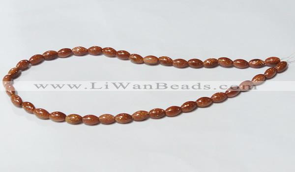 CGS69 15.5 inches 6*10mm rice goldstone beads wholesale