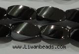 CHE161 15.5 inches 6*12mm twisted rice hematite beads