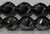 CHE166 15.5 inches 10*12mm twisted rice hematite beads