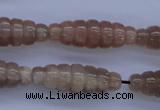 CMS135 15.5 inches 10*30mm carved rice natural moonstone beads