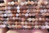 CMS1890 15.5 inches 5.5mm faceted round rainbow moonstone beads