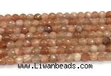 CMS2258 15 inches 6mm faceted round orange moonstone beads