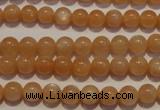 CMS701 15.5 inches 6mm round peach moonstone beads wholesale