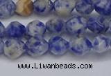 CNG6250 15.5 inches 6mm faceted nuggets blue spot stone beads